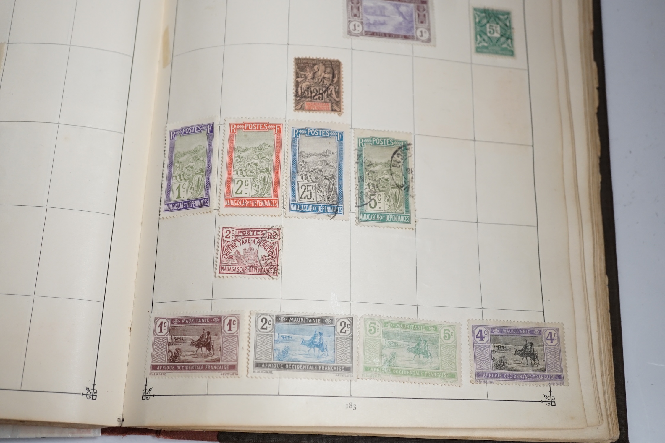 An old time collection of stamps in two albums, on leaves and loose with mint and used British Empire, USA, etc.